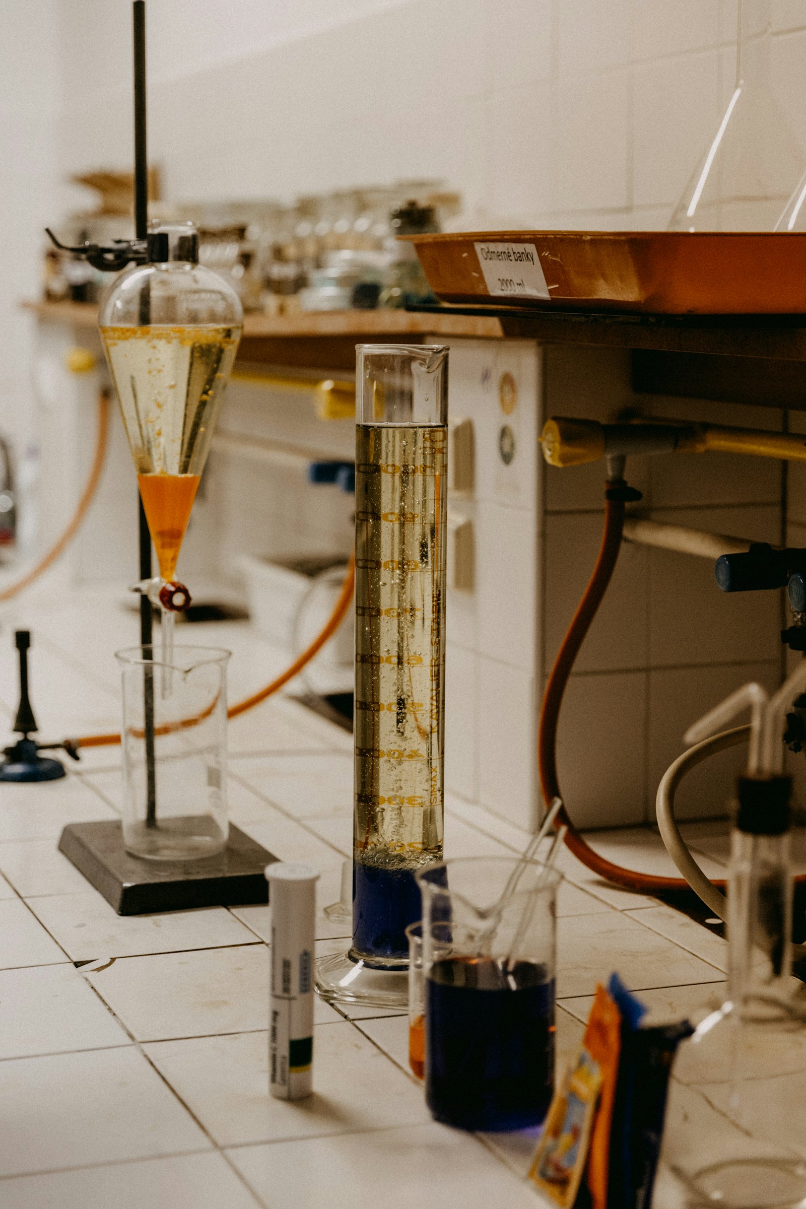 Laboratory consumables and glassware on a bench