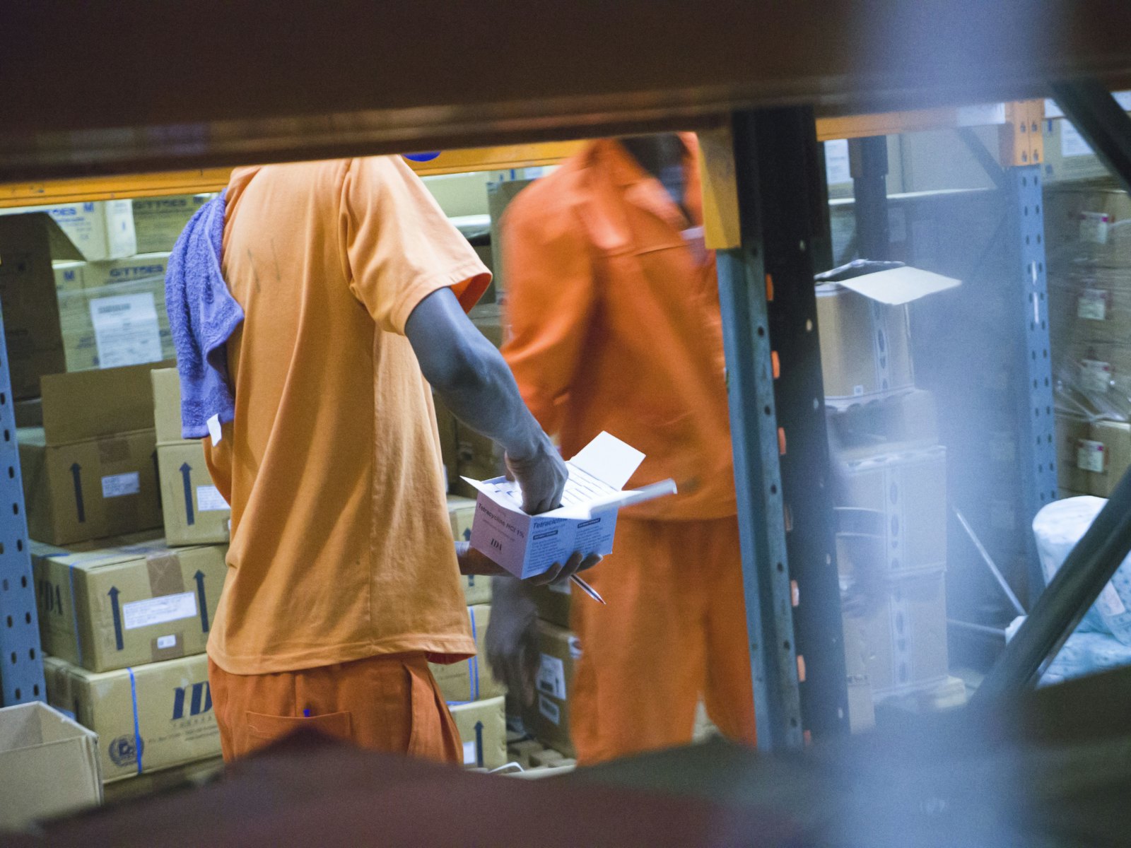 Dispatch coordinator preparing a tracked shipment
